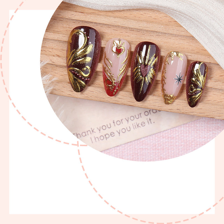 Decorative Press-On Nail Art Set with Intricate Gold Floral Design Bowlift