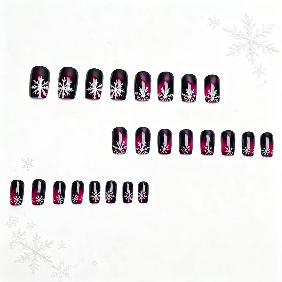 Artificial nails with festive snowflake design Bowlift