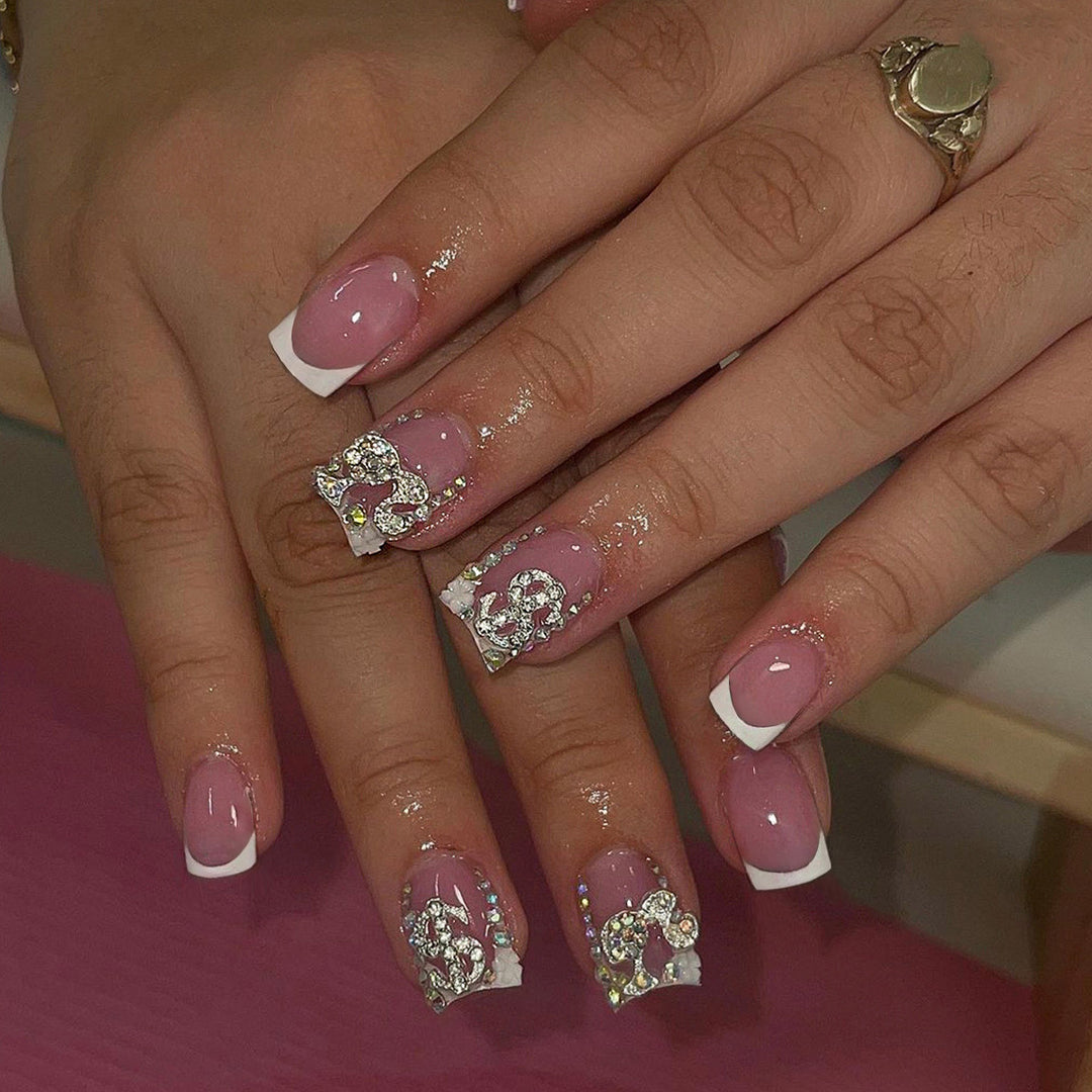 Premium artificial nails with sparkling 3D applications Bowlift