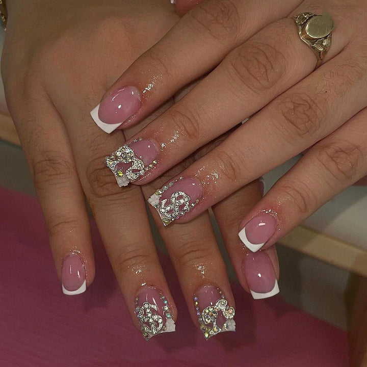 Premium artificial nails with sparkling 3D applications Bowlift