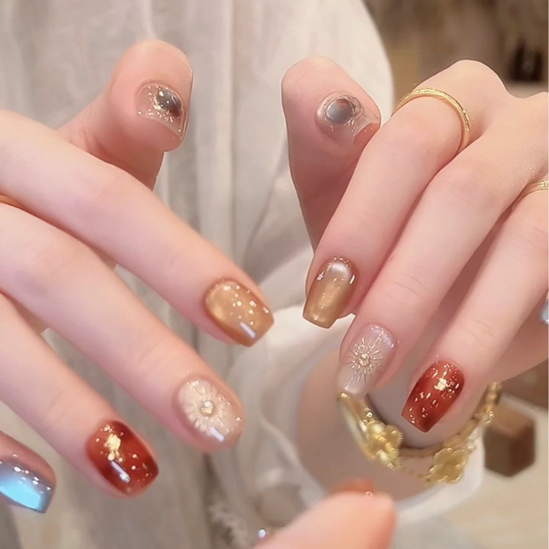 Artistic Nail Art Extensions with Floral Accents Bowlift