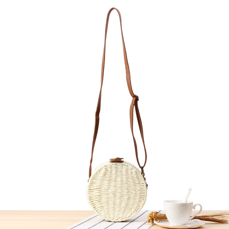Round basket bag with leather accents Bowlift