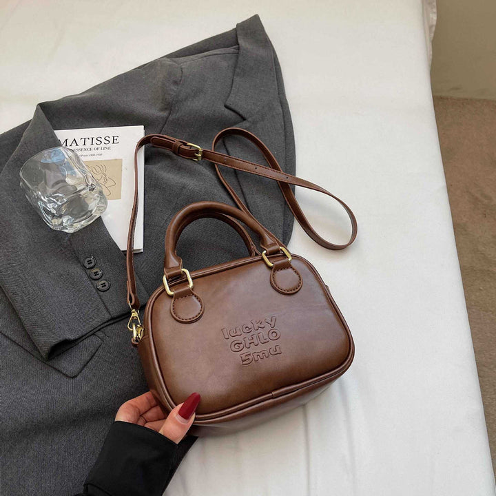 Vintage-Inspired Structured Handbag Bowlift
