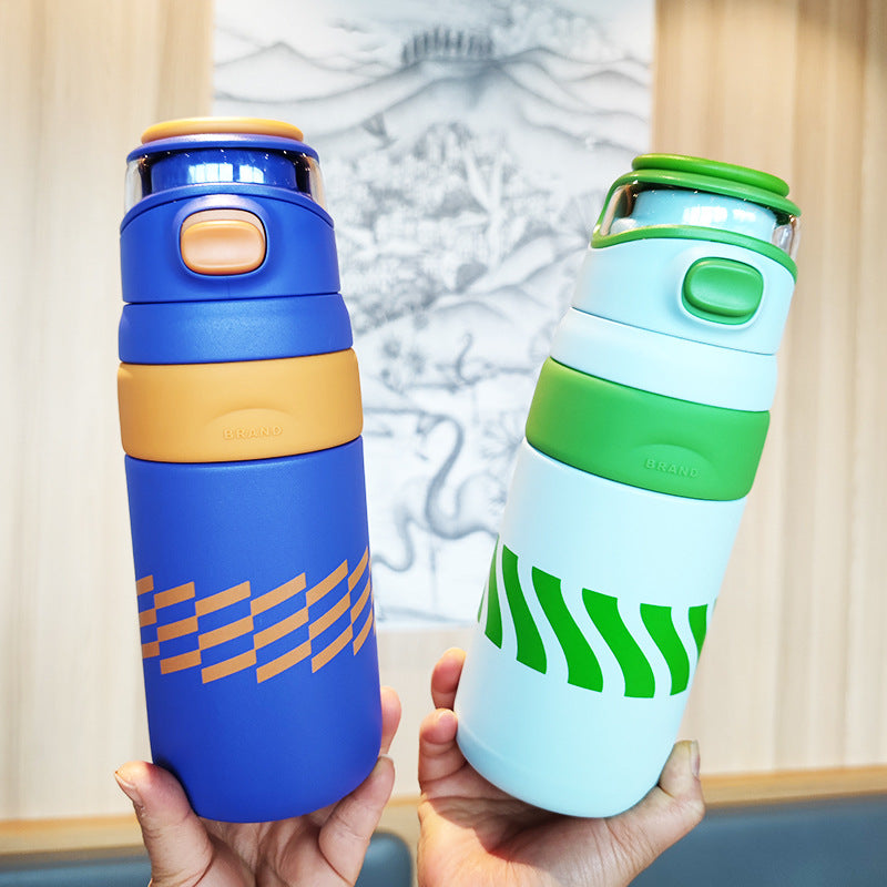 Women's BPA-free water bottle with innovative safety closure Bowlift