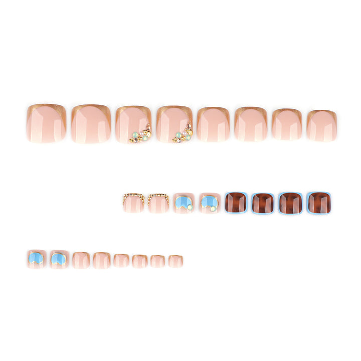 Artistic toenail art with elegant gold design Bowlift