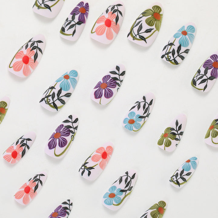 Artificial nails with floral accent Bowlift