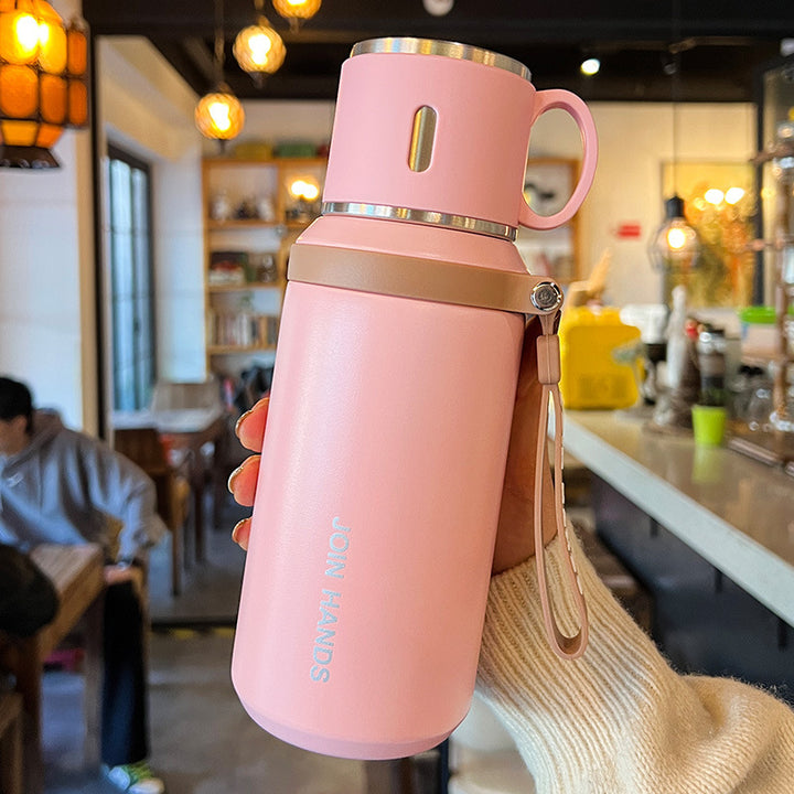 Women's insulated stainless steel drinking bottle with foldable cup Bowlift