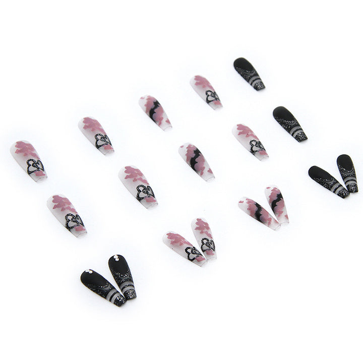 Artificial nail set with creative 3D elements and sparkling accents Bowlift
