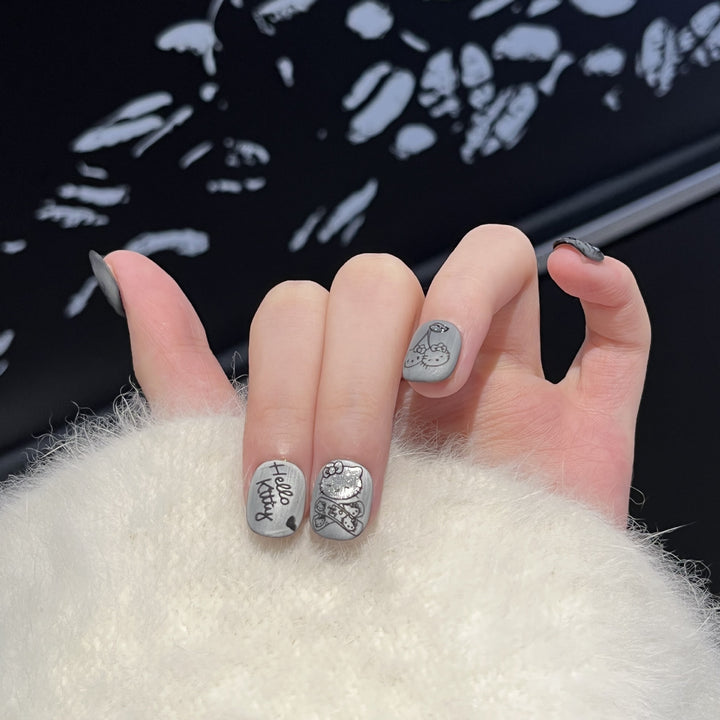 Artistic Press-On Nail Set with Whimsical Character Designs Bowlift
