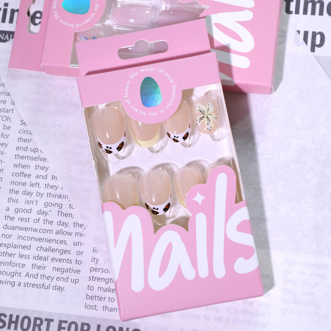 Exclusive nail art with floral design and glitter accents Bowlift