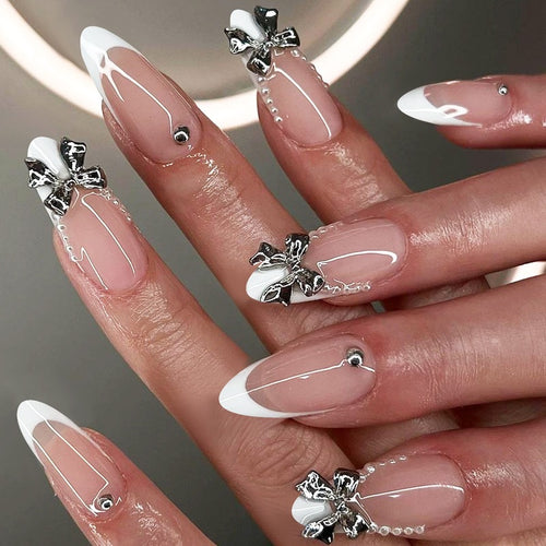 Acrylic nail set with elegant decorative embellishments Bowlift