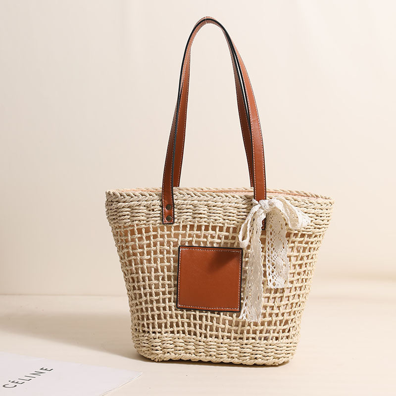 Handmade straw bag with elegant leather accents Bowlift