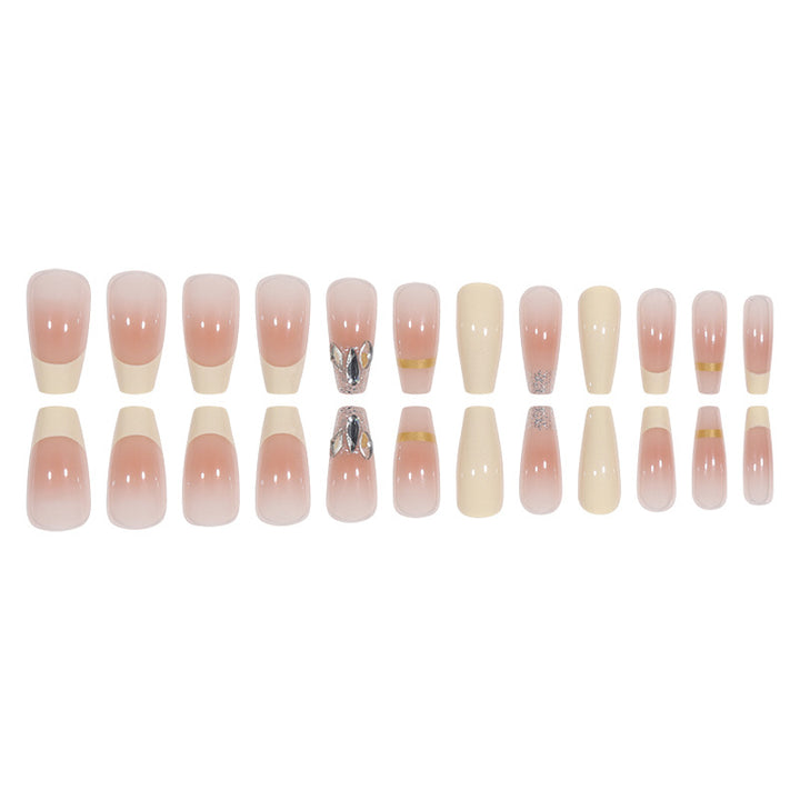 Elegant Long Press-On Nails with Rhinestone and Gold Accents Bowlift