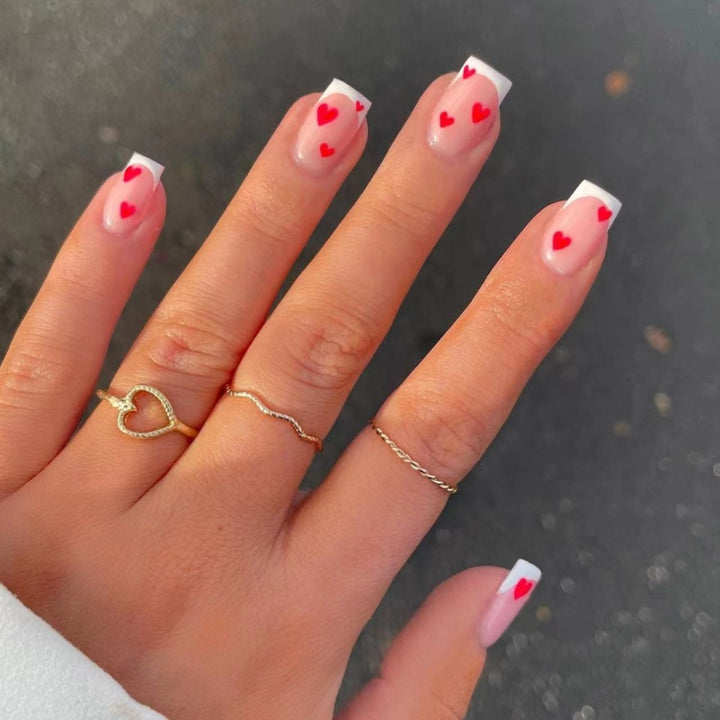 Heart-Embellished French Tip Nail Art Bowlift