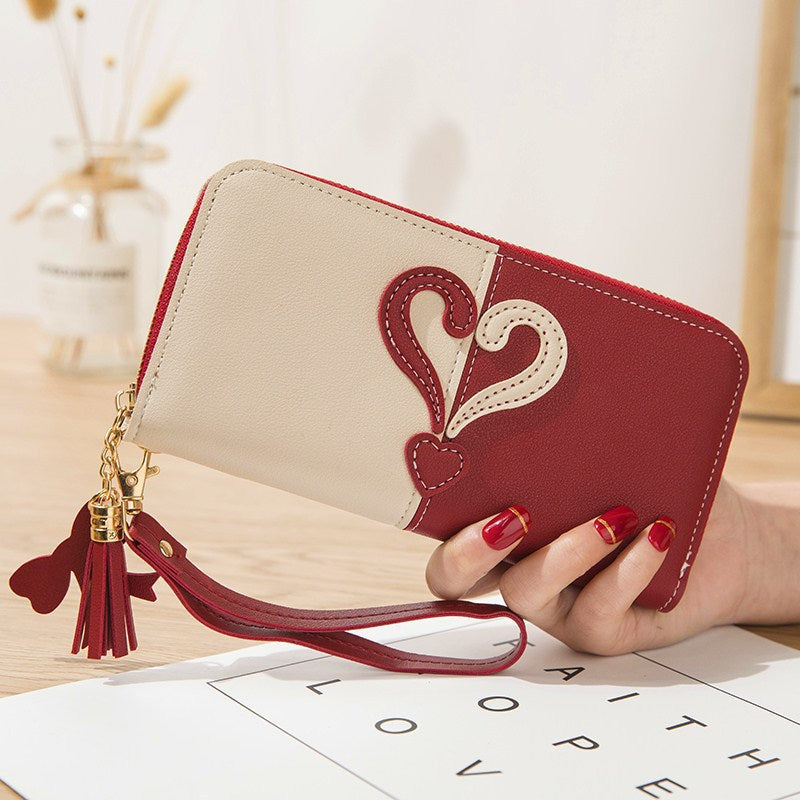 Stylish wallet with heart appliqués Bowlift