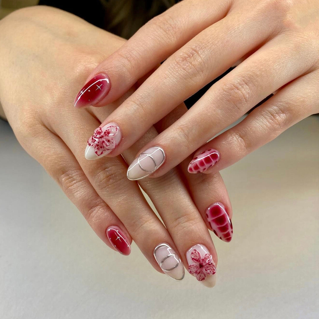 Artificial nails with floral accents and modern patterns Bowlift