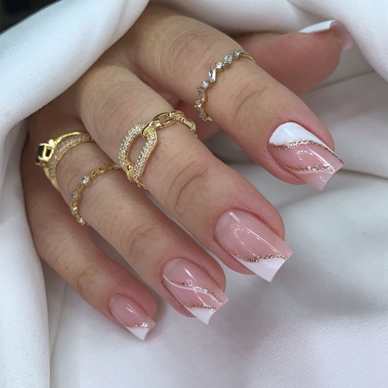 Elegant Stiletto Press-On Nail Art with Rhinestone Accents Bowlift