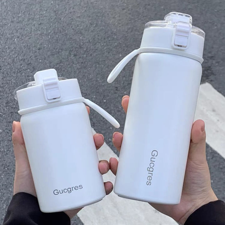 Ladies insulated drinking vessel with innovative flip lid Bowlift