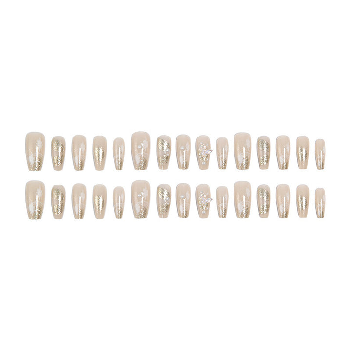 Glamorous artificial nails with heart-shaped accents Bowlift