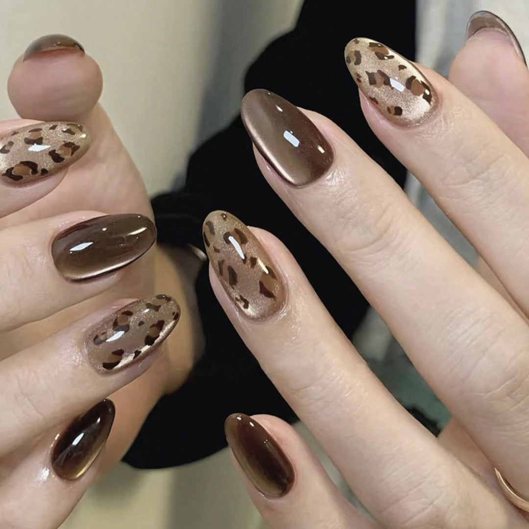 Artful nail extensions with unique leopard pattern and shine Bowlift