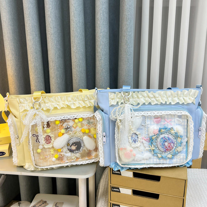 Shoulder bag with transparent front and playful applications Bowlift