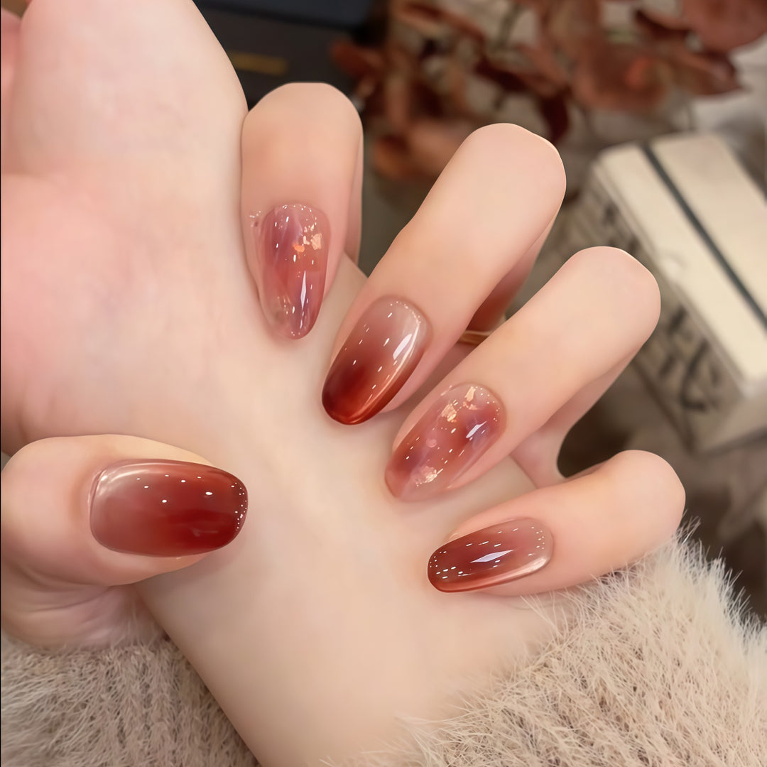 Artificial nails with elegant gradient and golden accents Bowlift