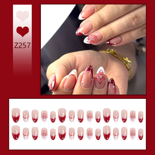 Artificial nails with floral and glittering accents Bowlift