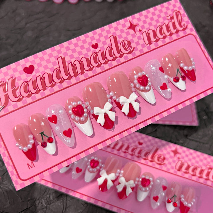 Artful Handmade Nail Art with Hearts and Ribbons Bowlift