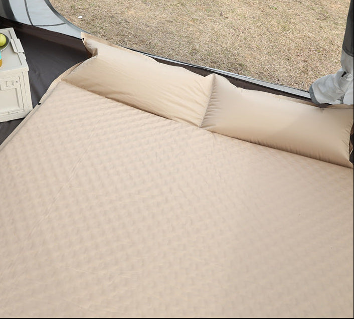 double connectable inflatable camping mattress with integrated dual pillows, egg-crate comfort surface and compact carry sack Bowlift