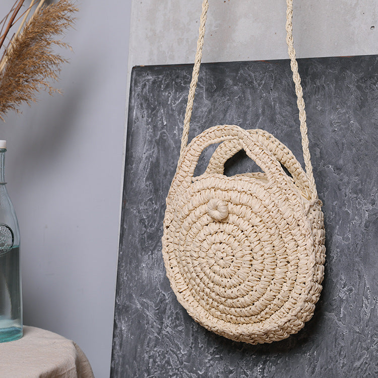 Handcrafted Round Wicker Bag with Elegant Closure Bowlift