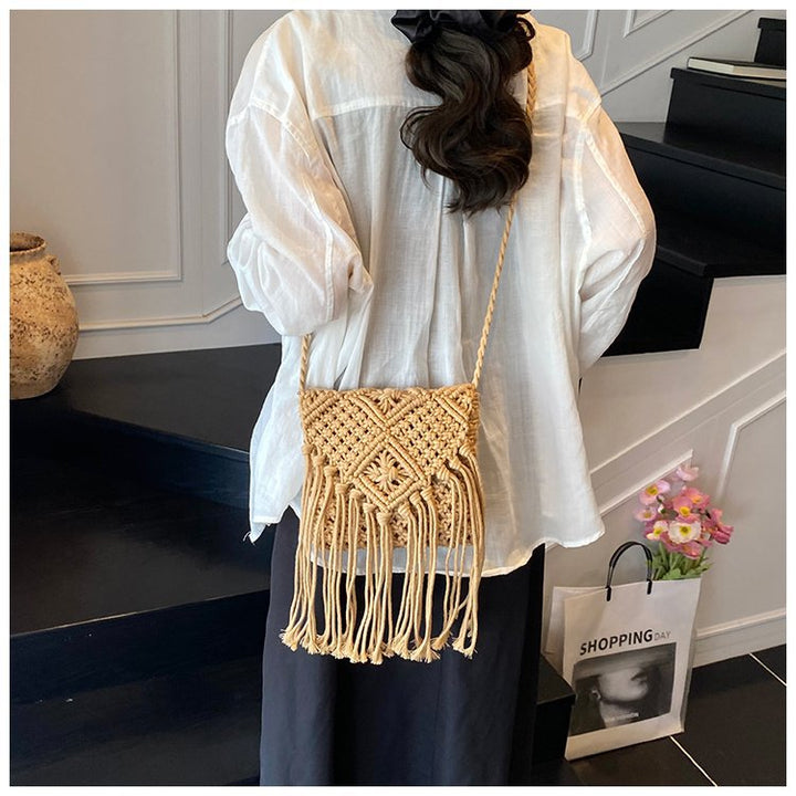Macrame shoulder bag with fringed accents Bowlift