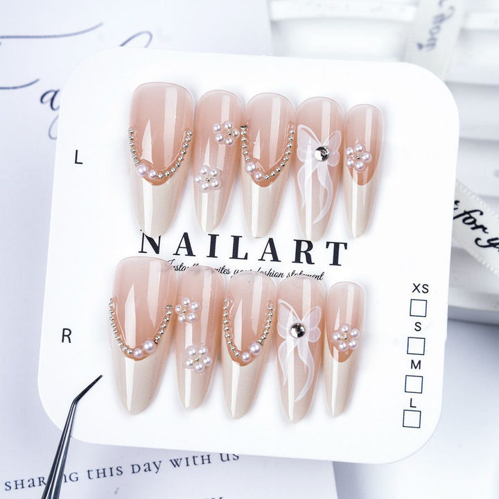 Artistic Stiletto Press-On Nail Set with Floral Embellishments Bowlift