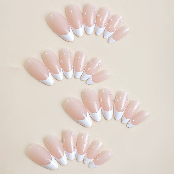 Artificial nail set with elegant tips and pearl decorations Bowlift