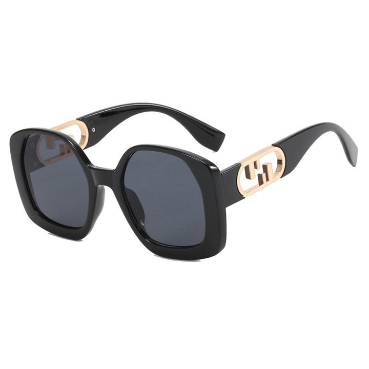 Women oversized sunglasses with extravagant geometric frame and elegant accents Bowlift