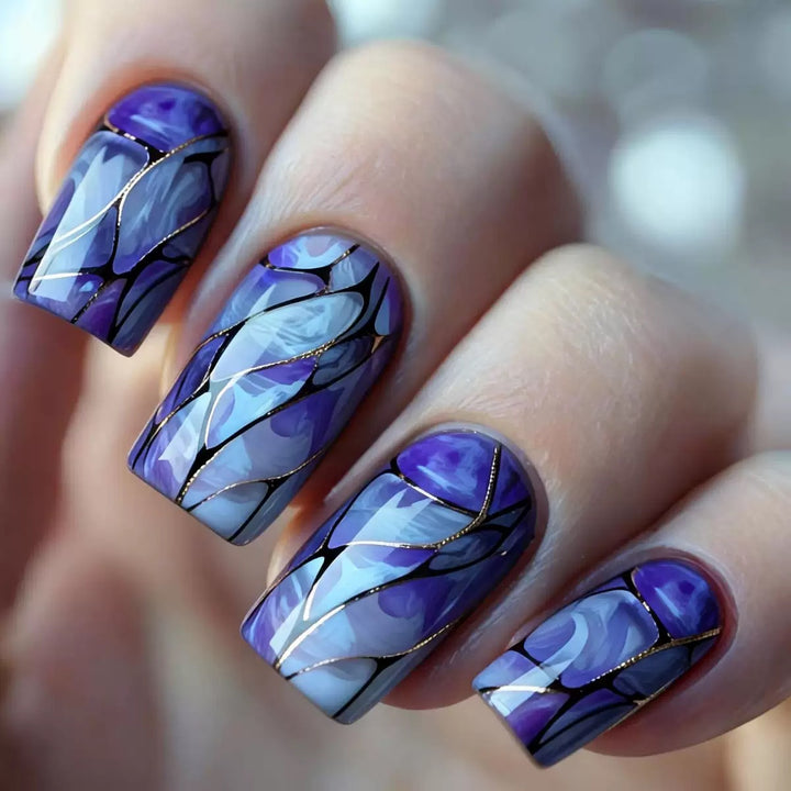 Acrylic nail set with luxurious marble design and elegant accents Bowlift