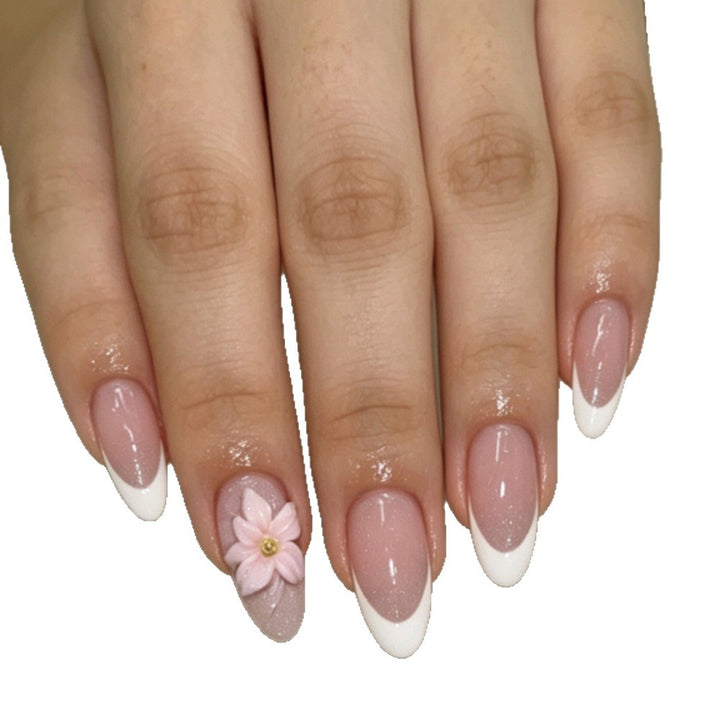 Artificial nails with floral decoration and elegant French tip design Bowlift