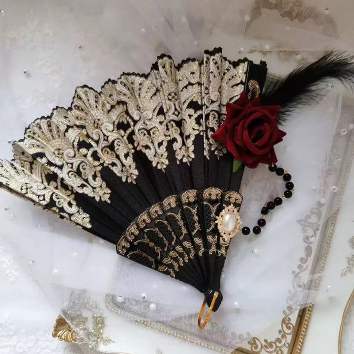 Women's fan with exquisite filigree ornamentation Bowlift