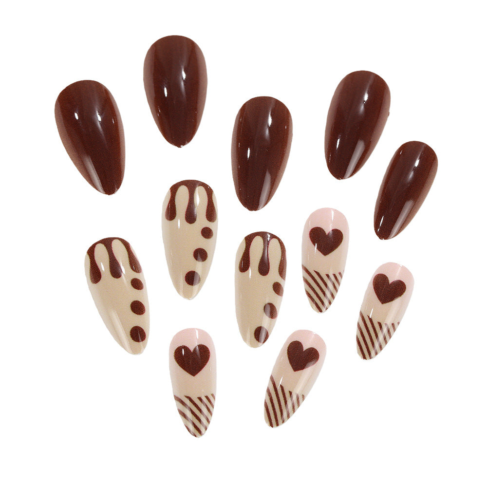 Artificial nails with creative heart and chocolate designs Bowlift