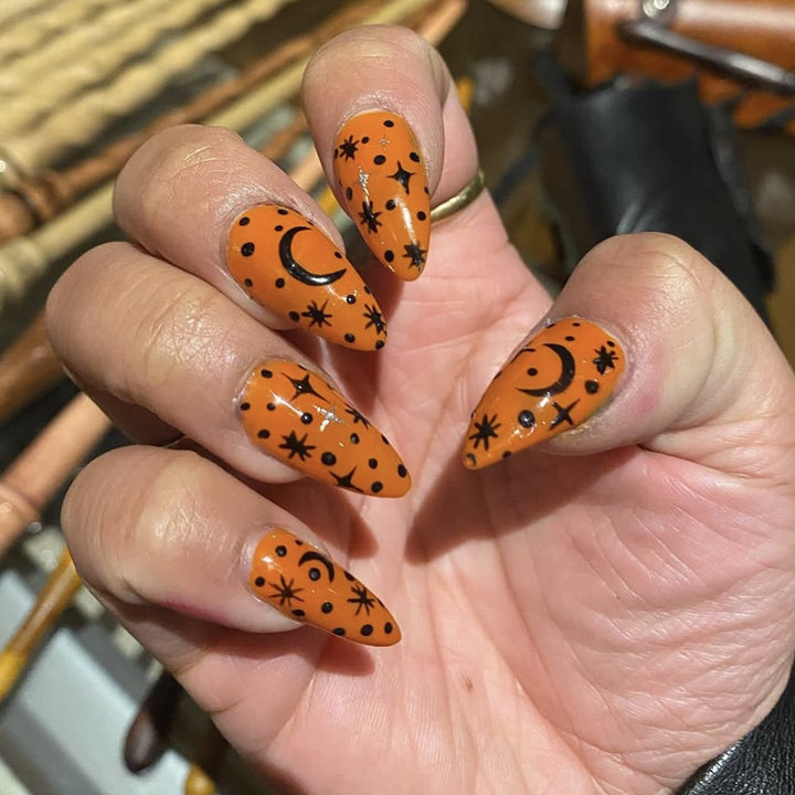 Artistic Press-On Nail Set with Cosmic Design Bowlift
