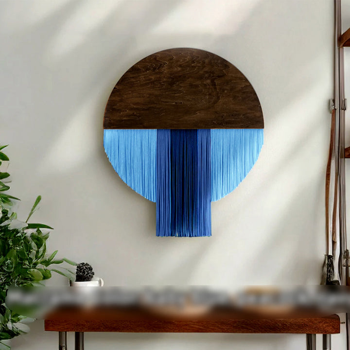 Wall hanging made of dyed yarn and wood
