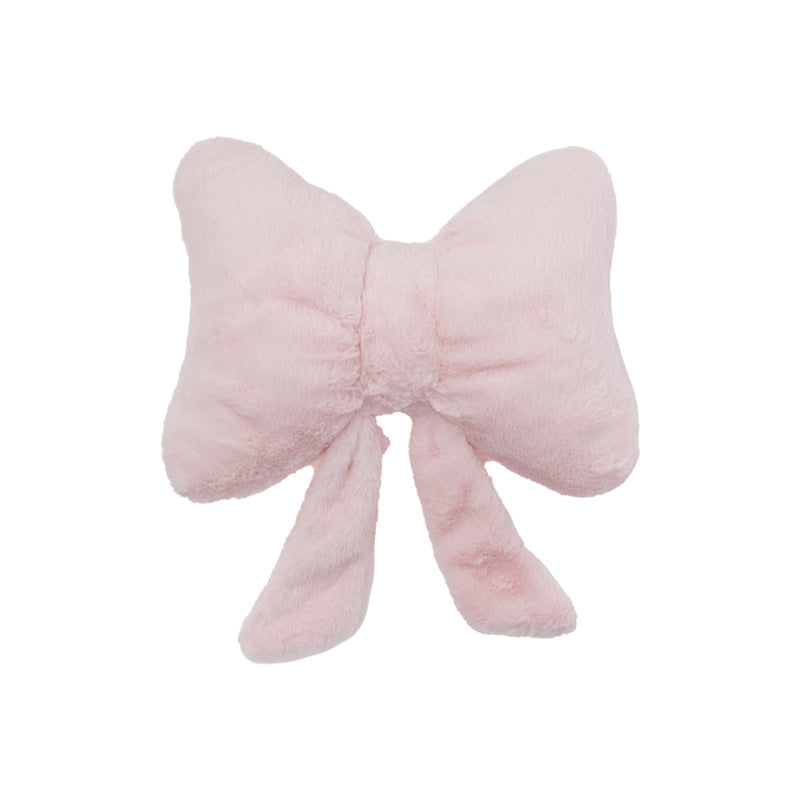plush bow-shaped decorative throw cushion with long tails and faux-fur texture Bowlift