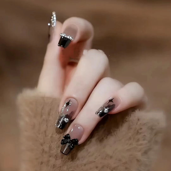 Artificial artificial nails with heart design and glitter elements Bowlift