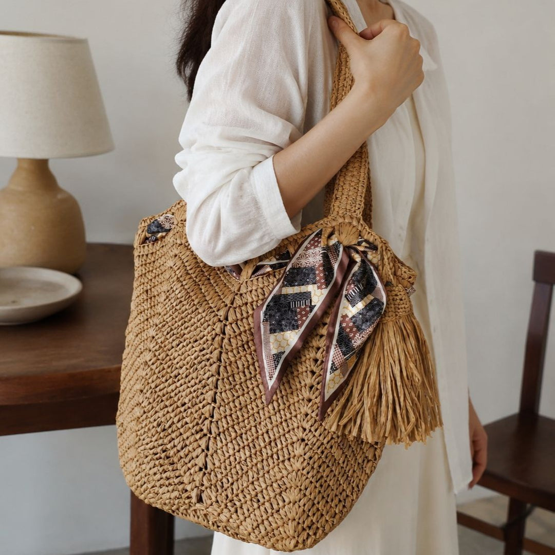 Handmade beach bag with playful pleat and tassels Bowlift