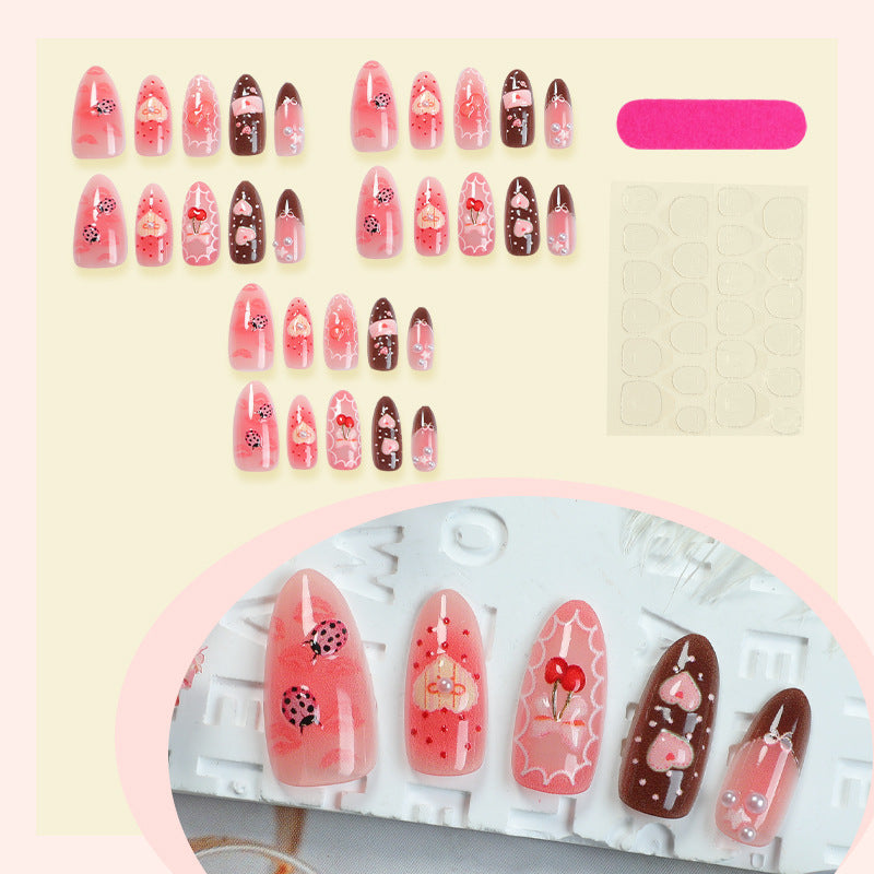 Artificial nail set with floral and playful tea motifs Bowlift
