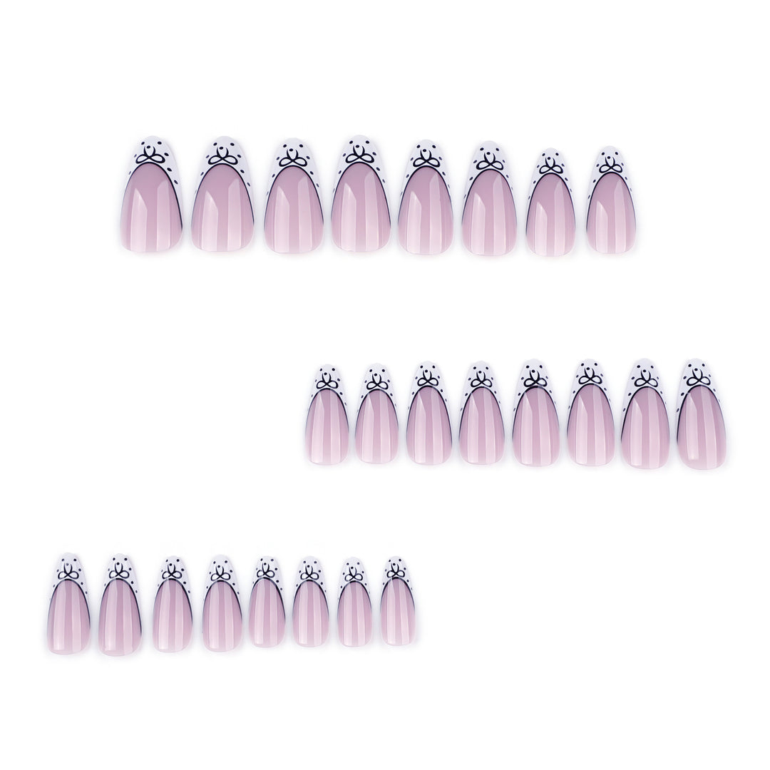 Artistic Stiletto Nails with Elegant Floral Design Bowlift