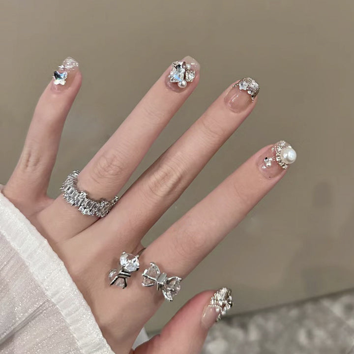 Artful Nail Art with Elegant Jewelry Design Bowlift