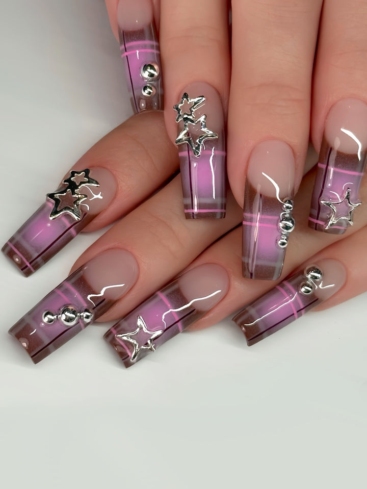Artistic Star-Embellished Nail Art Bowlift