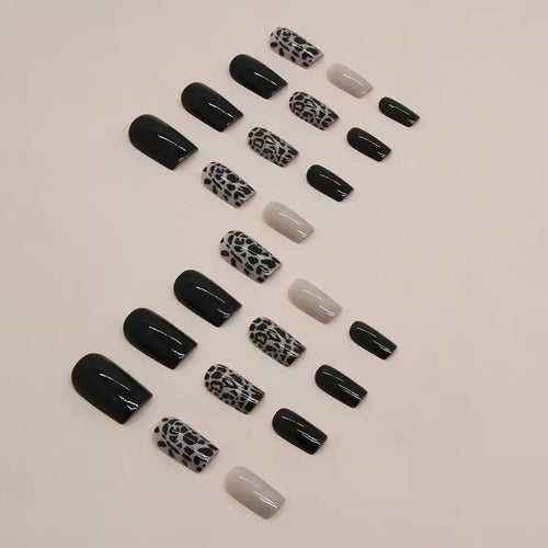 Acrylic nail set with stylish leopard pattern and elegant accents Bowlift