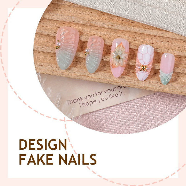 Artificial nail set with glamorous flower and glitter details Bowlift