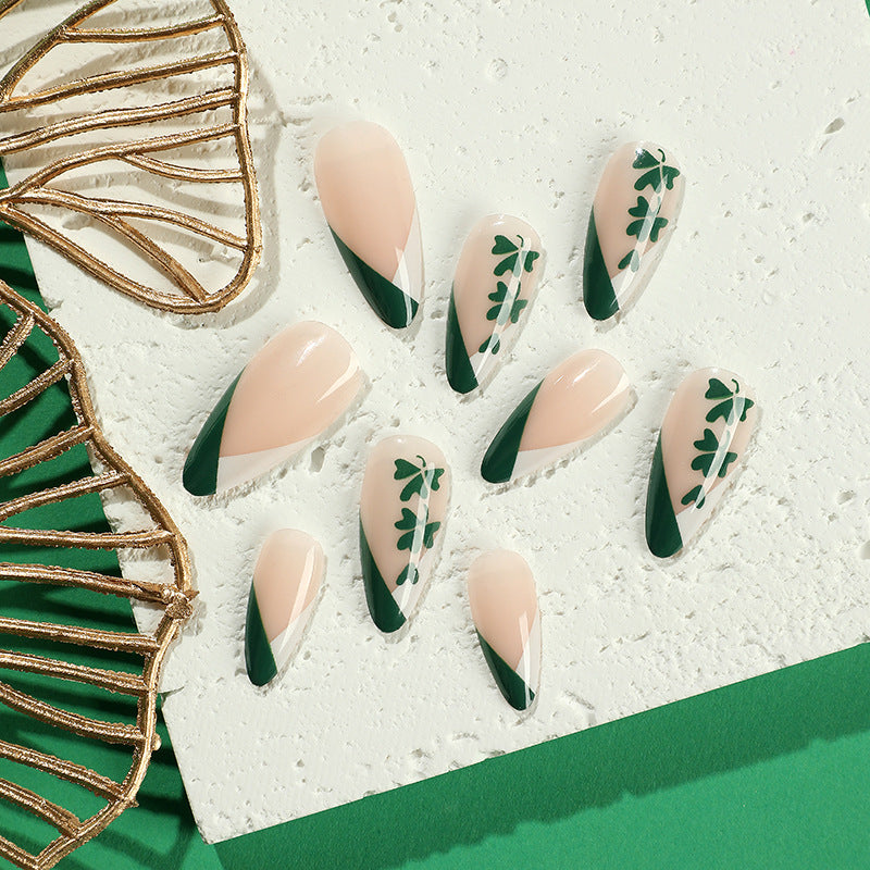 Artistic stiletto nails with cloverleaf design Bowlift